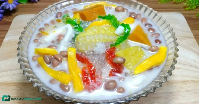 Một bát chè thập cẩm đầy màu sắc với các loại đậu, thạch, và nước cốt dừa béo ngậy.